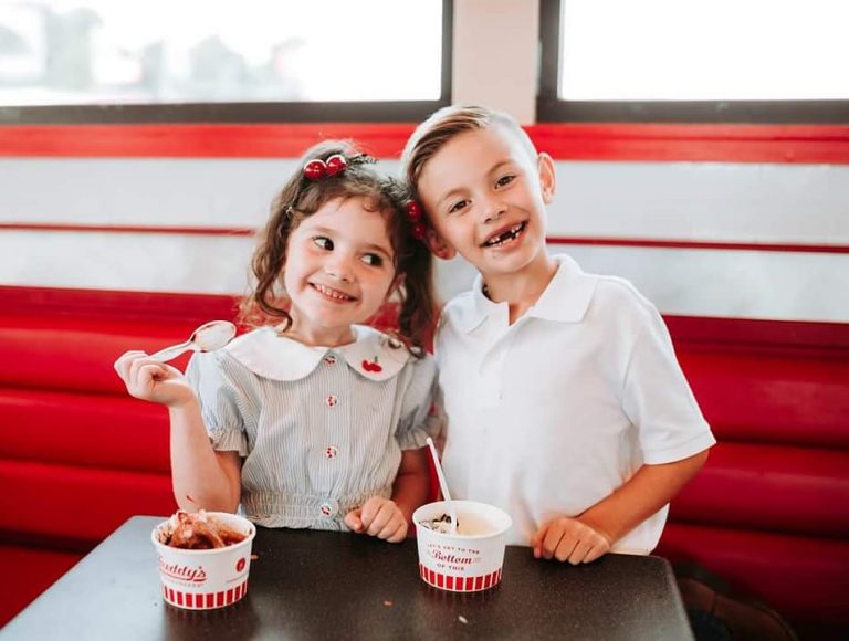 Family enjoying freddy's frozen custard & steakburgers