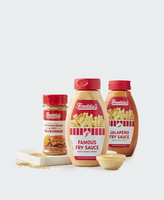 Freddy’s fry sauce and seasoning bottles