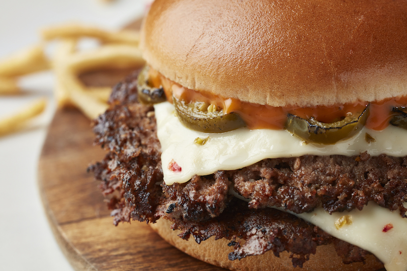 Freddy's Jalapeño pepper jack steakburger with melted cheese and jalapeno