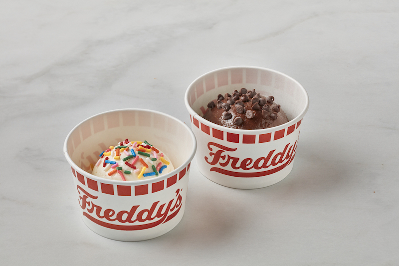 Freddy’s vanilla and chocolate frozen custard cups with toppings
