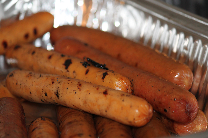 Pile of cooked hot dogs
