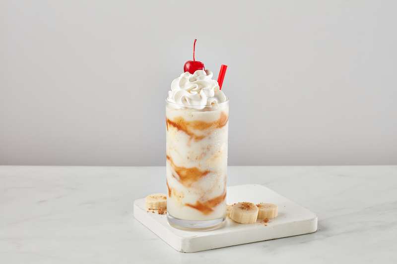 Freddy’s Bananas Foster shake topped with whipped cream and a cherry