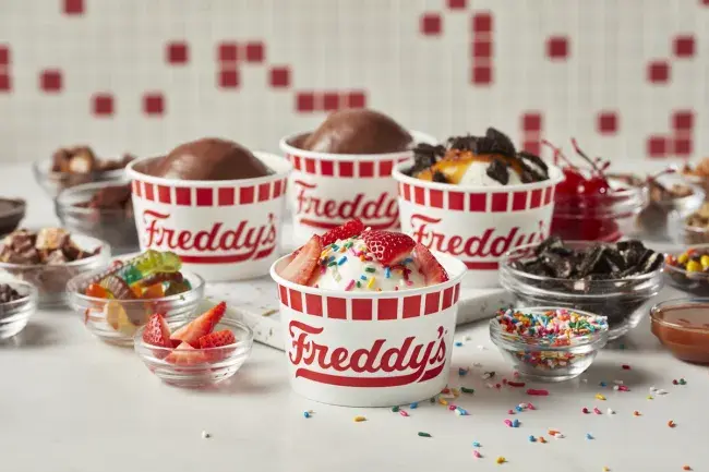Freddy’s Create Your Own Sundae catering with assorted toppings on display