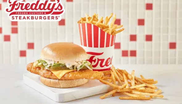 Freddy's Deluxe Crispy Fish Sandwich with shoestring fries