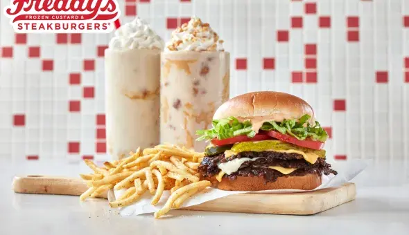 Freddy's Steakburger Stacker with fries, Reese's Peanut Butter Creamy Shake and Reese's Crunchy Peanut Butter Concrete