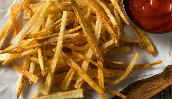 Crispy thin cut fries with ketchup
