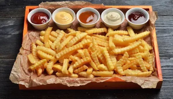 Crinkle-cut fries served with assorted dipping sauces
