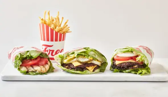 Three Freddy’s lettuce wraps with a side of fries