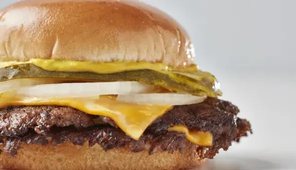 Freddy’s Original Double steakburger with melted cheese, pickles, onions and mustard